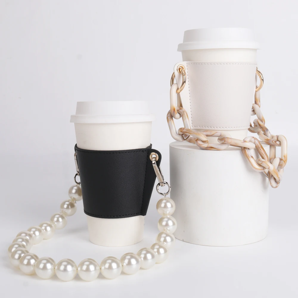 Reusable PU Leather Coffee Cup Sleeve Holder with Handle Alloy Acrylic Chain Strap Leather Cup Case
Reusable PU Leather Coffee Cup Sleeve Holder with Handle Alloy Acrylic Chain Strap Leather Cup Case