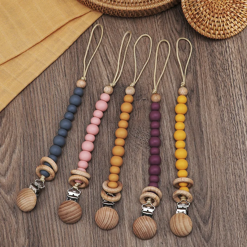 BPA Free Baby Teething Toys High Quality Baby Silicone Teether Pacifier Chain Holders Clip Colorful Baby Teether
BPA Free Baby Teething Toys High Quality Baby Silicone Teether Pacifier Chain Holders Clip Colorful Baby Teether