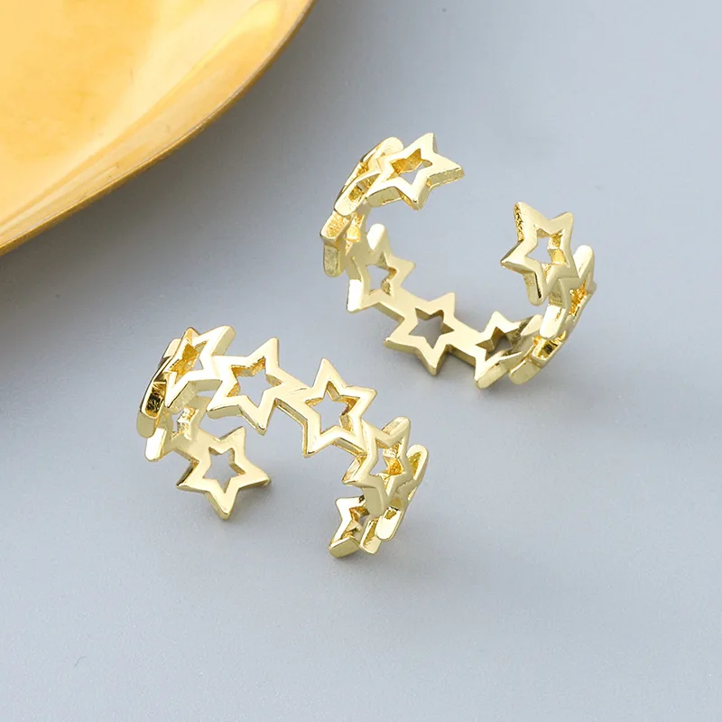 Korean Gold Color Brass Fashion Temperament Versatile Opening Adjustable Pentagram Star Rings
Korean Gold Color Brass Fashion Temperament Versatile Opening Adjustable Pentagram Star Rings