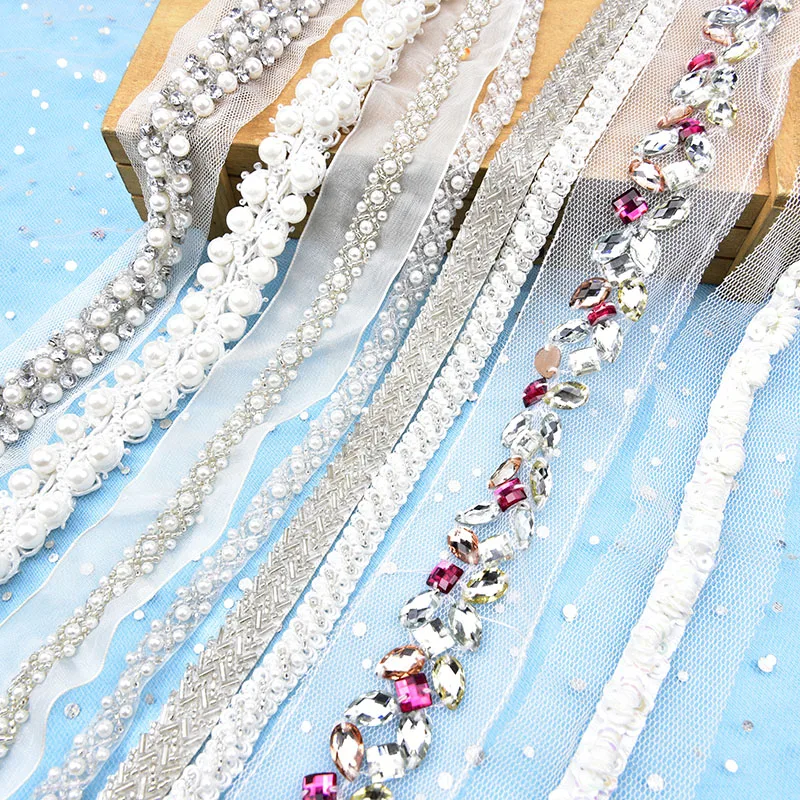 crystal rhinestone chain with white seed beaded trims hand sew on cotton ribbon for sewing garment trim
crystal rhinestone chain with white seed beaded trims hand sew on cotton ribbon for sewing garment trim