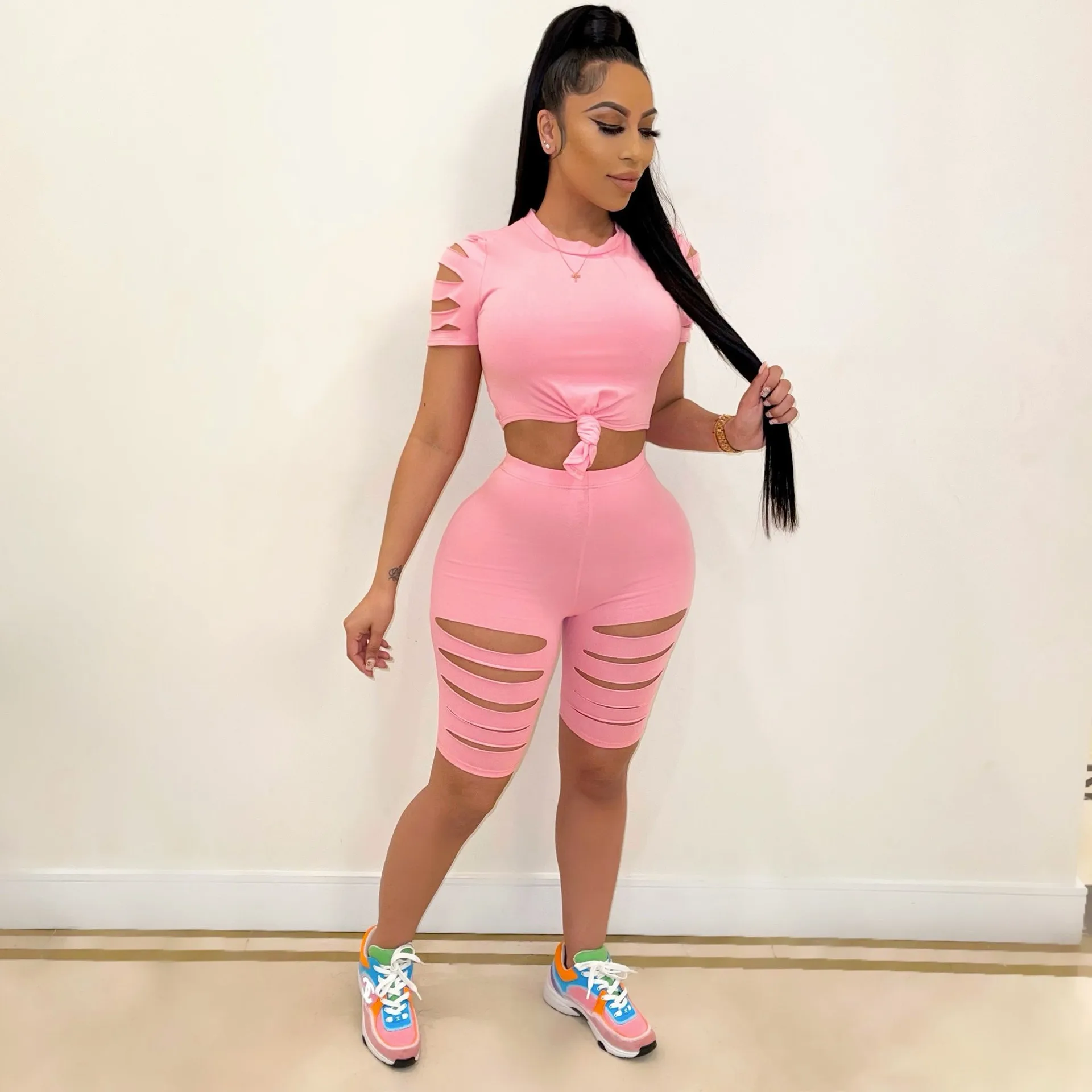 2021 New Arrival European and American Women's Pure Color Burning Flowers, Holes and Navels Sexy Sports two piece pants set
2021 New Arrival European and American Women's Pure Color Burning Flowers, Holes and Navels Sexy Sports two piece pants set