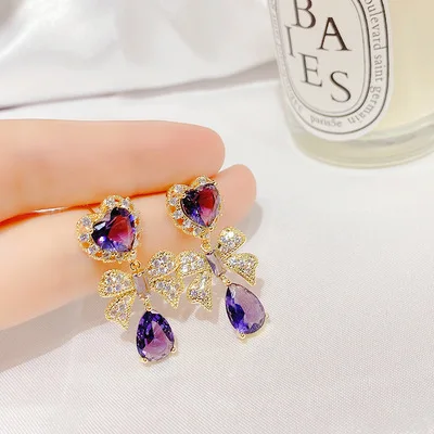 2021 New Luxurious Gold Plated Drop Earrings With Big Cute Purple Crystal Bowknot Earrings For Women Fashion Jewelry
2021 New Luxurious Gold Plated Drop Earrings With Big Cute Purple Crystal Bowknot Earrings For Women Fashion Jewelry