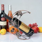 Moon shaped metal wine rack placed single bottle can be used in hotels or bars or restaurants