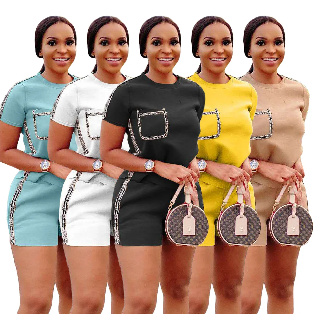 tshirt short sets women summer two piece casual fashion suits pockets design o-neck tops shorts sports tracksutis new collection
tshirt short sets women summer two piece casual fashion suits pockets design o-neck tops shorts sports tracksutis new collection