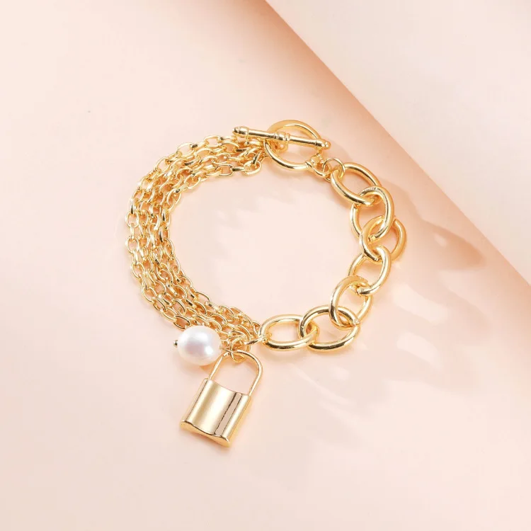 Fashion Hot Sale Vintage Gold Plated Hollow Link Chain Pearl Lock Pendant Bracelet Gold Tone OT Buckle Pearl Lock Bracelet
Fashion Hot Sale Vintage Gold Plated Hollow Link Chain Pearl Lock Pendant Bracelet Gold Tone OT Buckle Pearl Lock Bracelet