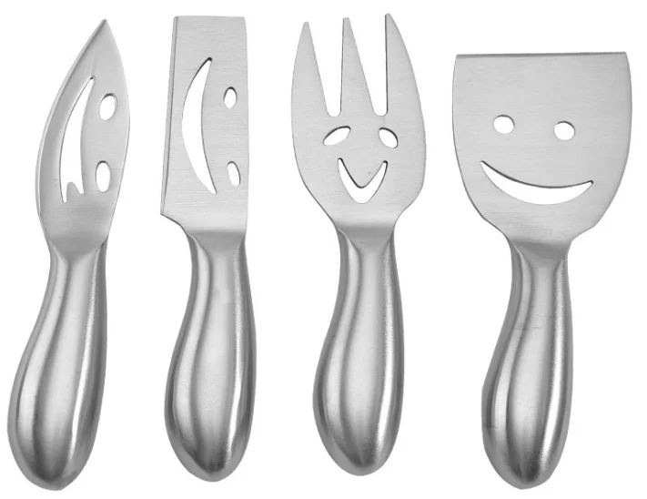 Stainless Steel 4 Pieces Smiling Faces Cheese Knife Set: Hard and Soft Cheese Knives, Serving Fork & Cheese Spreader, Silver
Stainless Steel 4 Pieces Smiling Faces Cheese Knife Set: Hard and Soft Cheese Knives, Serving Fork & Cheese Spreader, Silver