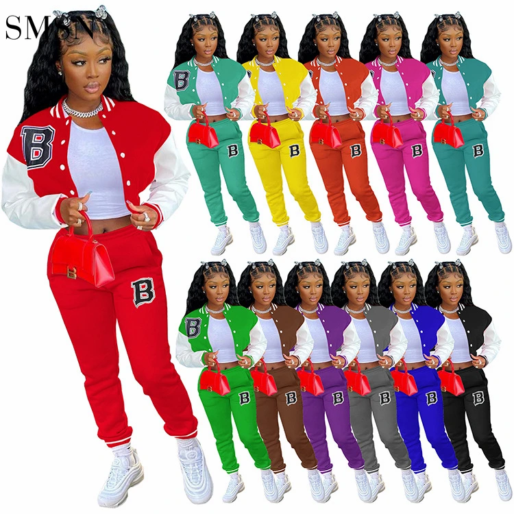 Letter Print Patchwork Long Sleeve Multi Button Short Coat Joggers Pants Two Piece Pants Set Winter Women Two Piece Set
Letter Print Patchwork Long Sleeve Multi Button Short Coat Joggers Pants Two Piece Pants Set Winter Women Two Piece Set