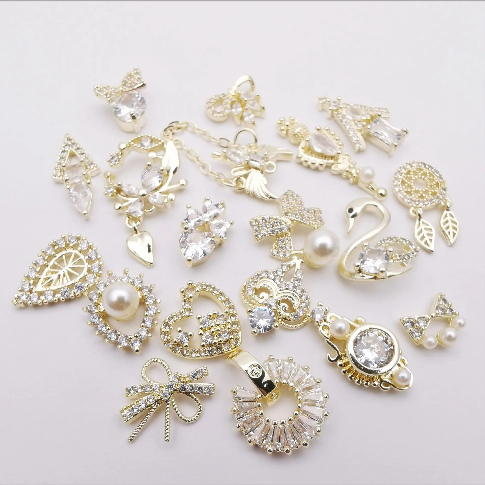 Wholesale Nail Art Gold Plating Zircon Alloy Charms Nail Ornaments for Nail Accessories
Wholesale Nail Art Gold Plating Zircon Alloy Charms Nail Ornaments for Nail Accessories