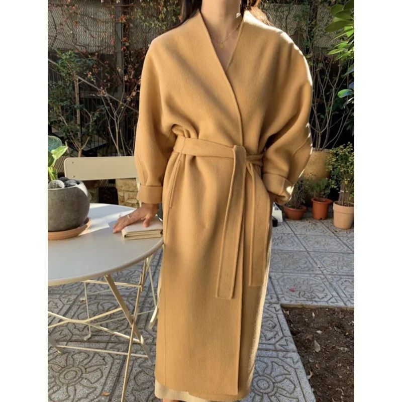 2023 Korean chic woolen autumn and winter coat retro temperament loose tie up long woolen coat for women
2023 Korean chic woolen autumn and winter coat retro temperament loose tie up long woolen coat for women