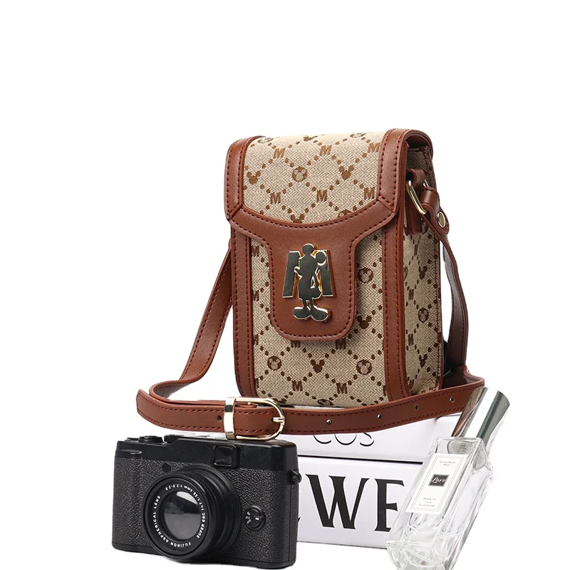 OEM FAMA Authorized Cartoon Character Fashionable Camera holder Cross body Flap Bag For Cell Phone Shoulder Bag
OEM FAMA Authorized Cartoon Character Fashionable Camera holder Cross body Flap Bag For Cell Phone Shoulder Bag