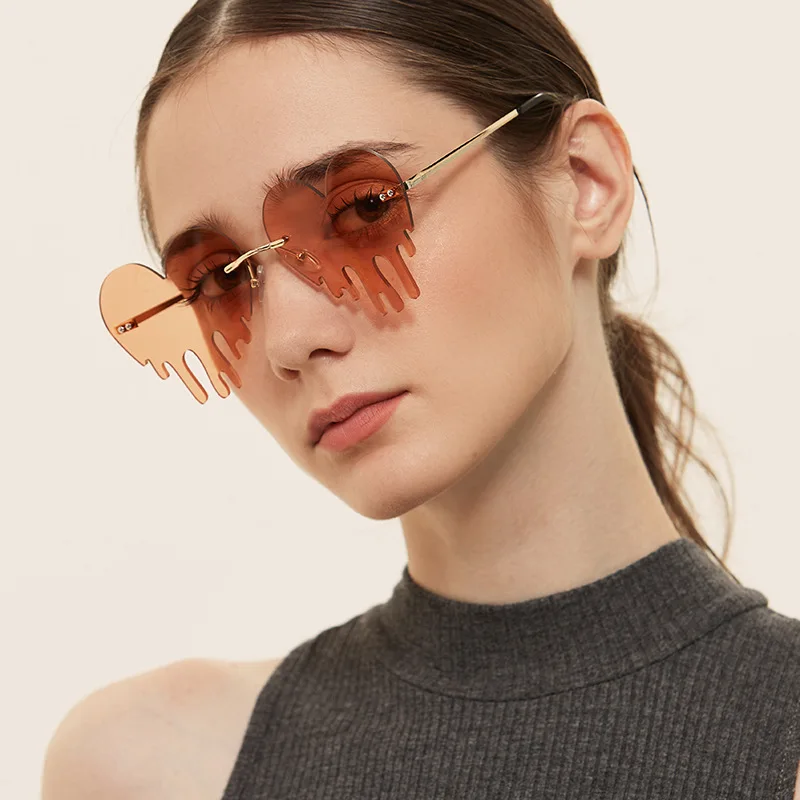 High quality retro tassel metal frame women trendy frameless sun glasses heart frame party glasses, Choice
High quality retro tassel metal frame women trendy frameless sun glasses heart frame party glasses, Choice