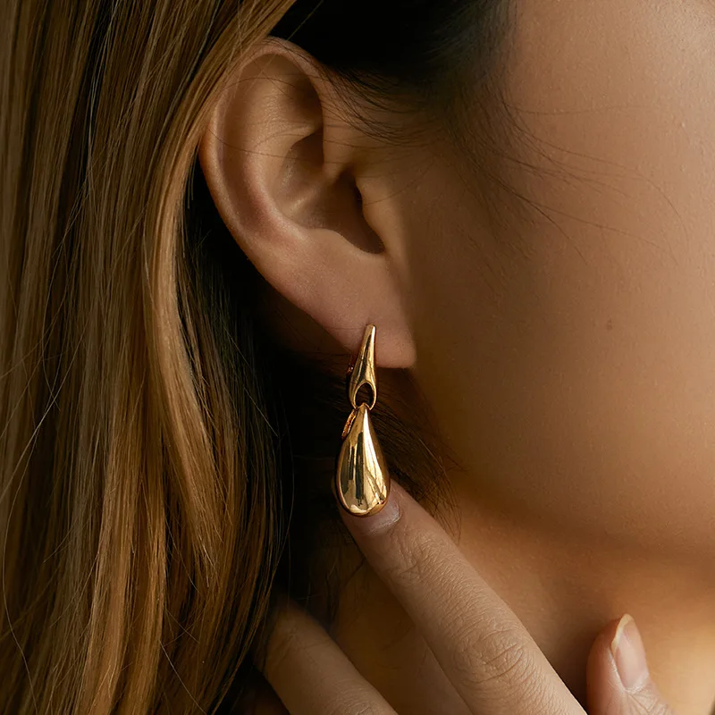 Fashionable Lady Water Drops Earrings Simple Geometric Gold Earrings Shiny Metal Texture Luxury Jewelry Earring
Fashionable Lady Water Drops Earrings Simple Geometric Gold Earrings Shiny Metal Texture Luxury Jewelry Earring