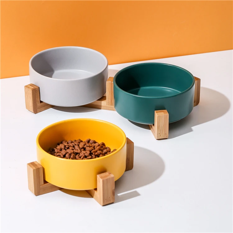 Wholesale hot cat food and dog water multicoloured ceramic rounded pet bowl with bamboo frame
Wholesale hot cat food and dog water multicoloured ceramic rounded pet bowl with bamboo frame