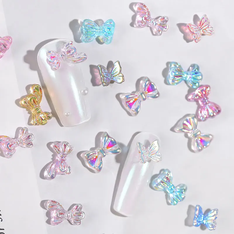 10Pcs/Box Aurora Colorful Mix 3D Bowknots Bear Butterfly Daisy Flowers Designs Nail Art Decorations 
10Pcs/Box Aurora Colorful Mix 3D Bowknots Bear Butterfly Daisy Flowers Designs Nail Art Decorations