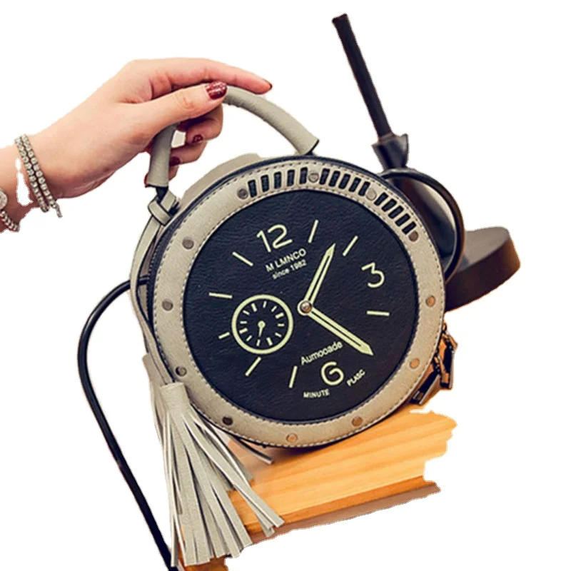 Fashion clock design leather round sling bag with fringe tassel woman hand bag, Pink gray black
Fashion clock design leather round sling bag with fringe tassel woman hand bag, Pink gray black
