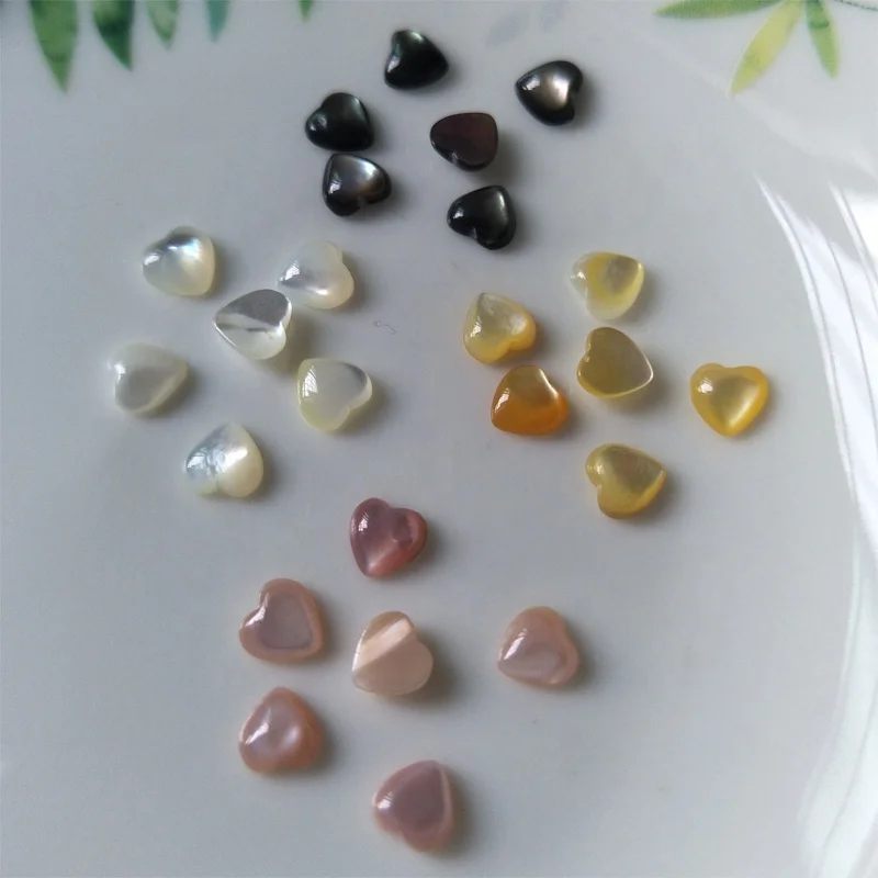 Wholesale natural pearl shell heart-shaped shell inlay ring face jewelry cabochon, White, black, yellow, pink
Wholesale natural pearl shell heart-shaped shell inlay ring face jewelry cabochon, White, black, yellow, pink