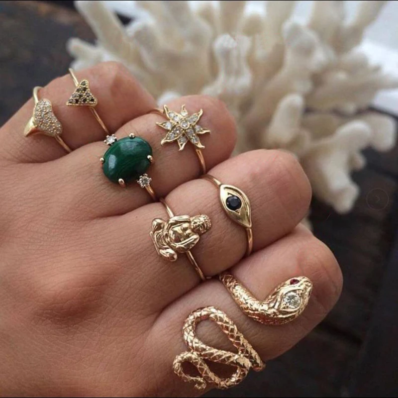 7pcs/set Gold Color Crystal Flower Geometric Black Eye Green Stone Buddha head Finger Ring Punk Snake Rings Women
7pcs/set Gold Color Crystal Flower Geometric Black Eye Green Stone Buddha head Finger Ring Punk Snake Rings Women