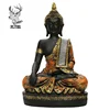 Small solemn sacred religious resin buddha statue with sitting