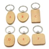 /product-detail/wholesale-high-quality-promotional-customize-carving-logo-blank-wooden-keychain-60705311593.html