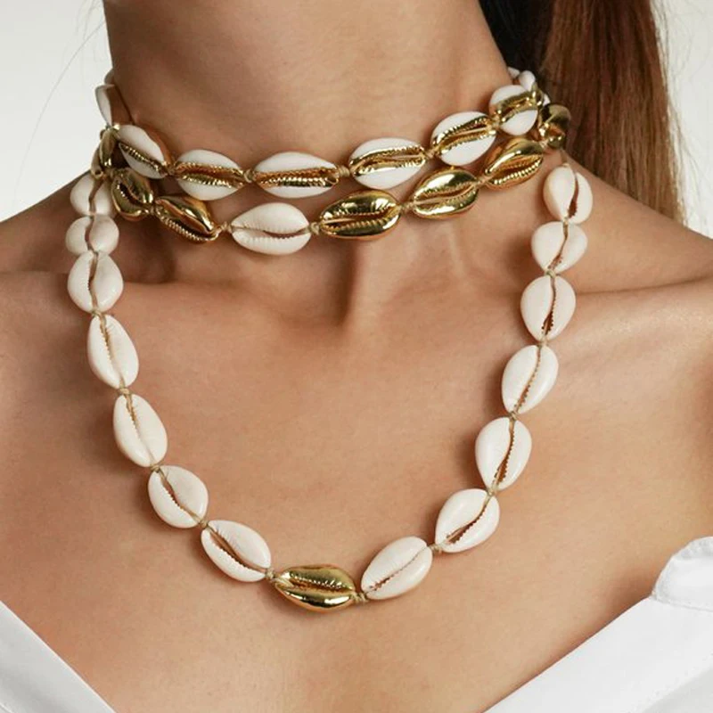 Original Nature White Shell Choker Necklace Beige Cord Gold Color Cowrie Shell Choker Necklace
Original Nature White Shell Choker Necklace Beige Cord Gold Color Cowrie Shell Choker Necklace