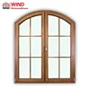 Arch blind inside large double glass windows