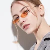 /product-detail/sunflower-2019-hot-sell-individuality-extra-small-eye-oval-rimless-candy-ocean-lens-90-s-sunglasses-62100535625.html
