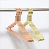 Popular metal wire rose gold clothes hanger stand for clothes and coat hanger hook dry cleaning