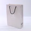 /product-detail/factory-wholesale-custom-silver-foil-luxury-paper-bag-with-rope-white-paper-bags-with-handles-62109986983.html