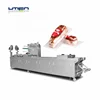 Fresh meat block pork poultry vacuum thermoforming packaging equipment in flexible film