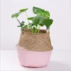 Customized wholesale belly straw basket woven seagrass natural rattan handmade storage basket with handles in Korean