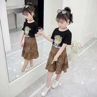 Hot Sale Girls Summer Outfits Leopard Printed Skirt Kids Boutique 2 Piece Clothing Set
Hot Sale Girls Summer Outfits Leopard Printed Skirt Kids Boutique 2 Piece Clothing Set