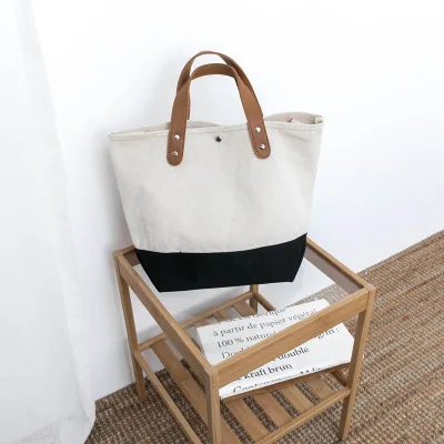 Korean style women canvas tote bag,heavy duty jute tote bag with leather strap,custom plain canvas tote bag with leather straps
Korean style women canvas tote bag,heavy duty jute tote bag with leather strap,custom plain canvas tote bag with leather straps