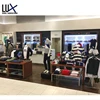 modern store interior designs with LED lighted wall-mounted glass cubes and shelves