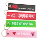 China Manufacture Custom Polyester Fabric Keychain Type Embroidered Key Chain