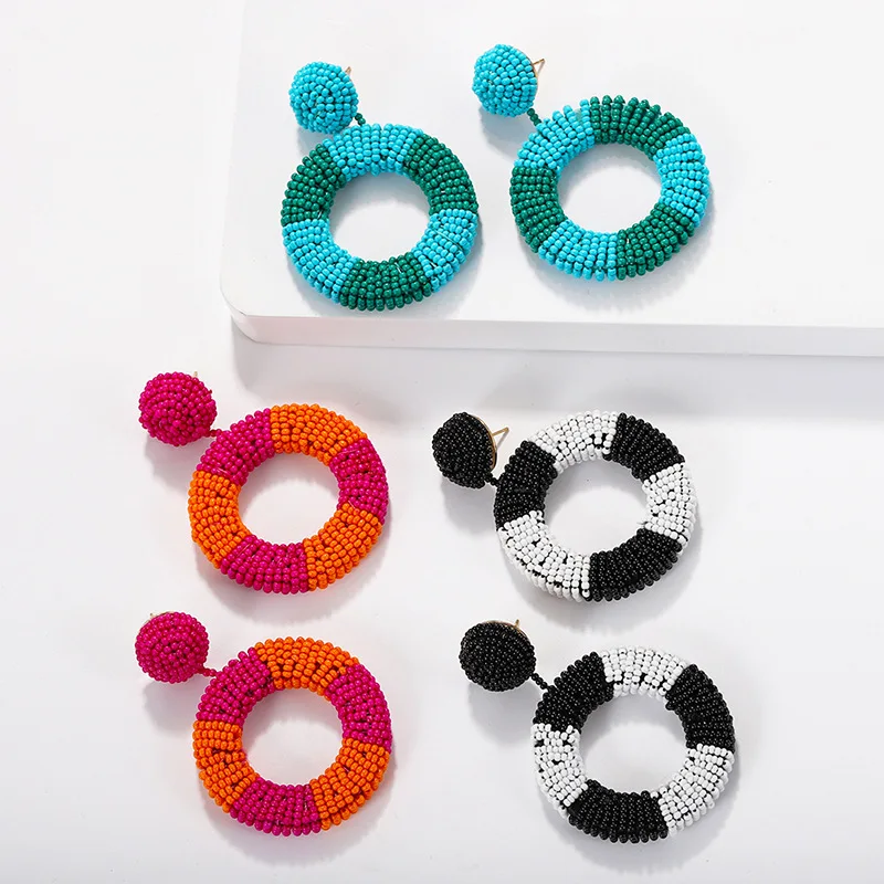 Bohemian personality Millet beads Two-color stitching earrings fashion women's round hollow hand-woven rice beads earrings
Bohemian personality Millet beads Two-color stitching earrings fashion women's round hollow hand-woven rice beads earrings