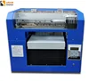 Small desktop T-shirt printing machine with 6 channels CMYKWW textile ink for home use