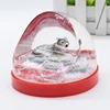 Customized plastic snow globe with resin sitting wolves inside for home decoration