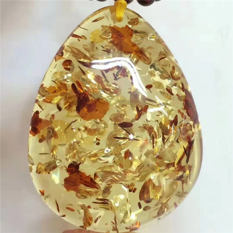 China gemstone jewelry wholesale natural safflower amber necklace for women beautiful rare amber pendant
China gemstone jewelry wholesale natural safflower amber necklace for women beautiful rare amber pendant