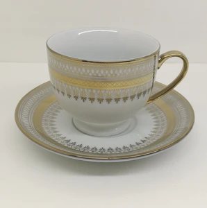 tea cup and saucer gold