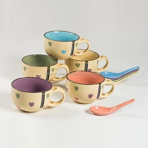 ceramic soup bowl with spoon and handle