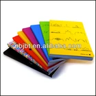 Various spiral notebook with colored paper