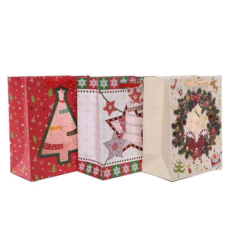 packing custom made merry christmas tree paper gift bags with