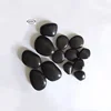 Cheaper home decorative polished pebbles colorful BLACK artificial stone plastic pebble