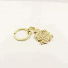 China suppliers custom zinc alloy casting crafts golden bronze antique plate enamel epoxy resin laser 3D logo OEM keychain