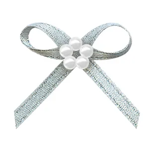 white pre-tied ribbon bow