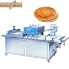 Automatic paratha dough ball pressing film covering machine for frozen chapati roti thepala making food industries