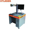 XT LASER laser 20W 30W 60W CO2 laser marking machine for bottles online production