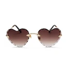 Glazzy gradient color frameless sunglasses female retro Harajuku cute travelling sunglasses from China
