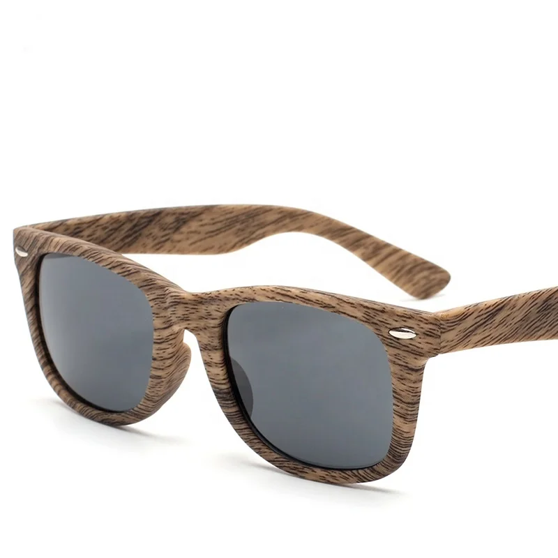 China custom logo personality high grade brand design wooden color plastic sunglass, Customed color
China custom logo personality high grade brand design wooden color plastic sunglass, Customed color