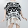 Oversized jacquard knitted pattern sweater with fringes